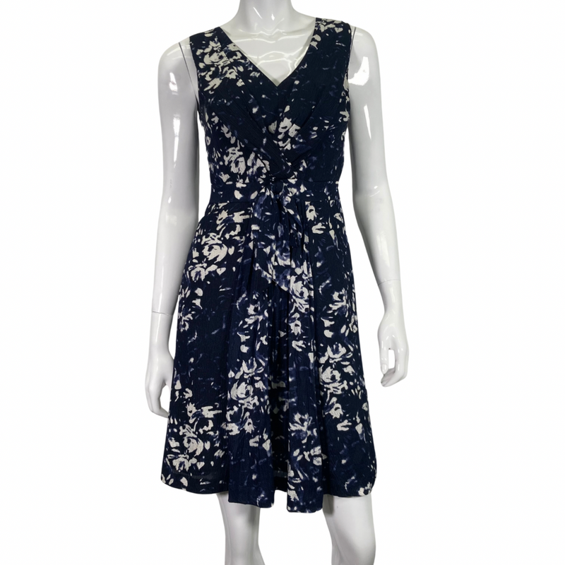 Load image into Gallery viewer, Tory Burch White Floral on Navy-blue Dress, Featuring a unique pattern, flattering silhouette and cinched waist front view
