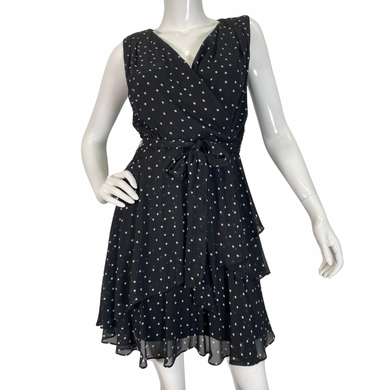 Tahari Black and White Polka Dot Dress is a charming and feminine piece front view