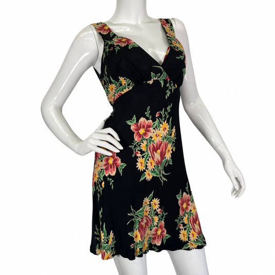 Betsey Johnson Floral sleeveless, V-neck black dress with colorful floral print and wide straps front view