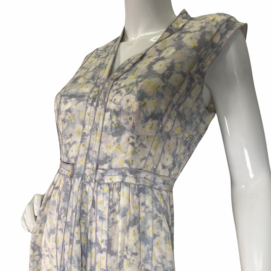 Rebecca Taylor Abstract Daisies Dress is a sleeveless, knee-length dress with a delicate floral print close up