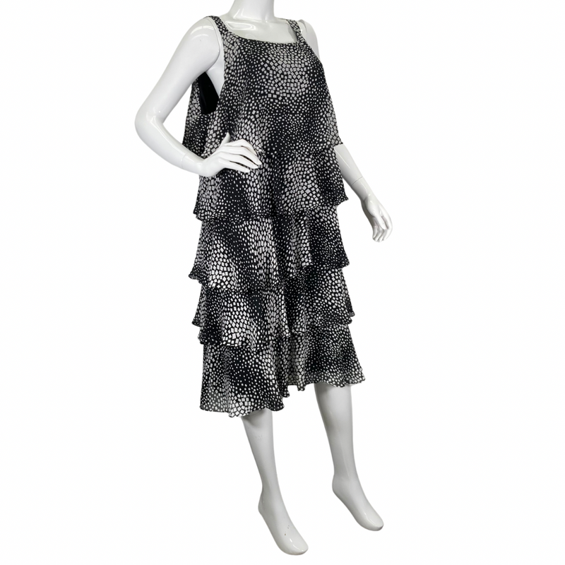 Load image into Gallery viewer, S.L. Fashions charming and playful black and white ruffle dress side view
