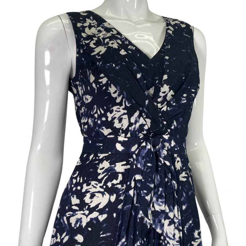 Load image into Gallery viewer, Tory Burch White Floral on Navy-blue Dress close up view of the cinched waist and belt
