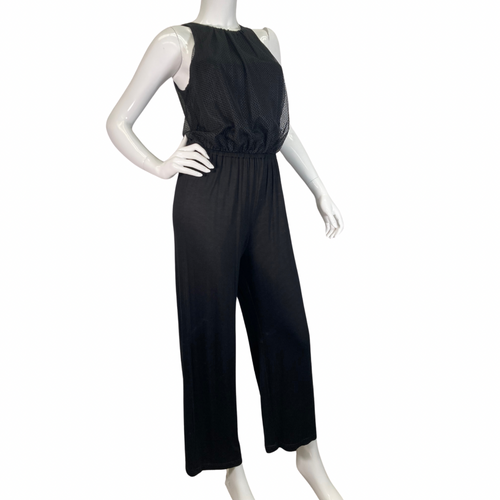 Trina Turk Black Sleek and Stylish Jumpsuit featuring a textured mesh overlay on the bodice for added dimension and elegance - full side view 