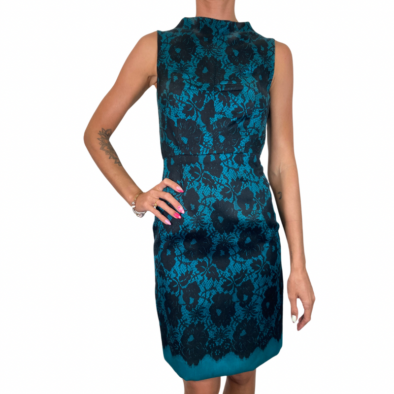 Load image into Gallery viewer, Milly Teal Dress with Black Lace Pattern - sophisticated sleeveless sheath dress featuring a striking teal base with a black floral lace overlay for an elegant and timeless look - front view
