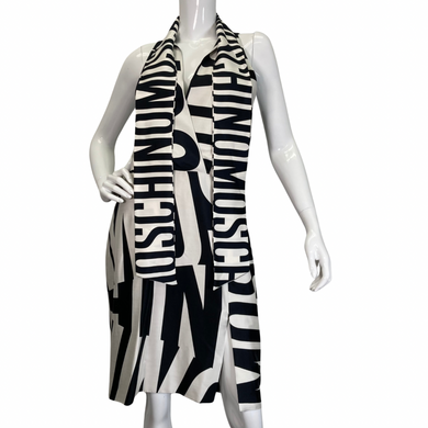 Moschino Couture Black and White Monogram Dress is a bold, statement piece with a monochromatic black-and-white color scheme front view