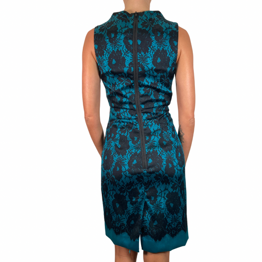 Milly Teal Dress with Black Lace Pattern - sophisticated sleeveless sheath dress featuring a striking teal base with a black floral lace overlay for an elegant and timeless look - backside view 