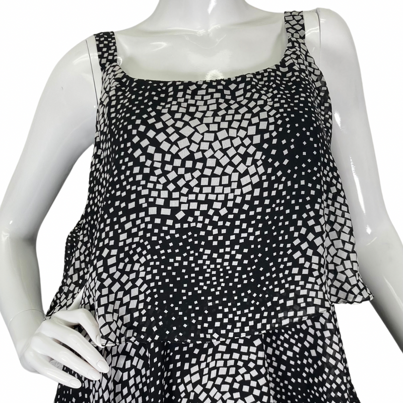 Load image into Gallery viewer, S.L. Fashions charming and playful black and white ruffle dress front view close up of neckline
