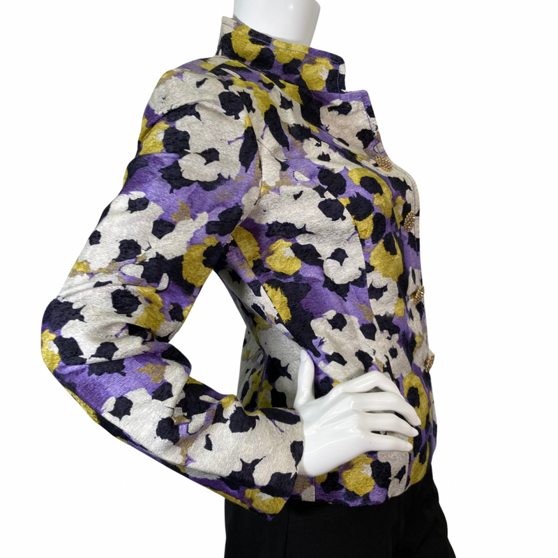 Load image into Gallery viewer, preloved St. John Vibrant Floral-Patterned Jacket features a vibrant a blend of bold mix of purple, yellow, black, and cream hues - side view closed buttons
