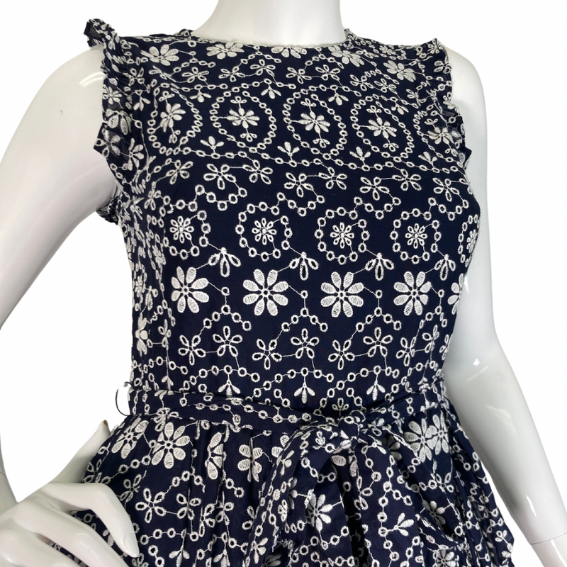 Load image into Gallery viewer, Kate Spade Navy Blue Dress with White Embroidered Florals - charming sleeveless dress featuring an intricate white floral and geometric pattern for a playful yet elegant look, front view close-up
