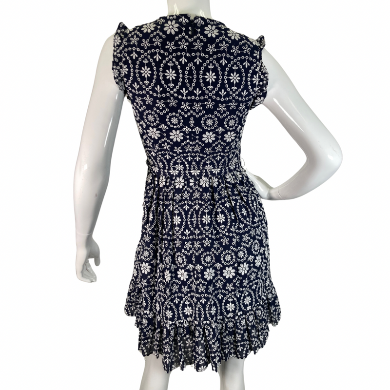 Load image into Gallery viewer, Kate Spade Navy Blue Dress with White Embroidered Florals - charming sleeveless dress featuring an intricate white floral and geometric pattern for a playful yet elegant look - backside view
