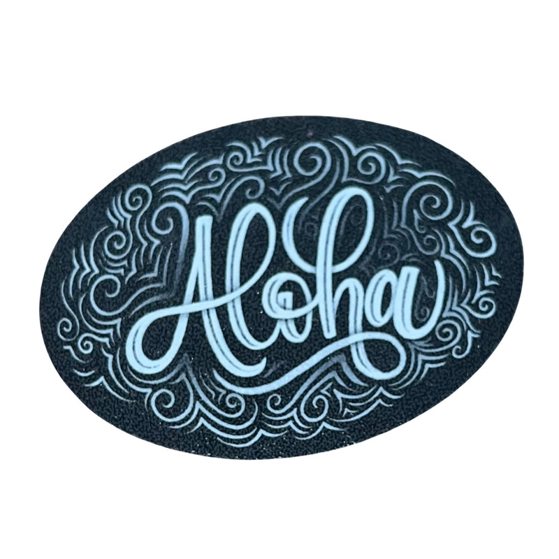 Load image into Gallery viewer, an oval clear sticker with the word Aloha hand-lettered in white
