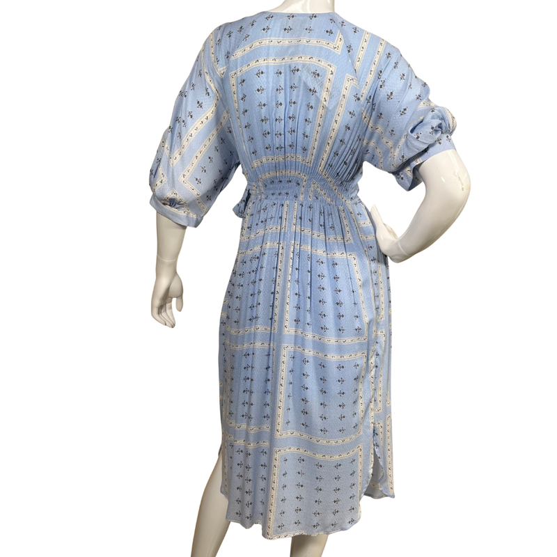 Load image into Gallery viewer, Blue patterned dress on a mannequin against a white background
