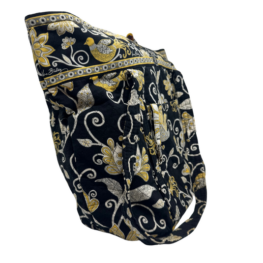 Vera Bradley Shoulder Bag with Floral Pattern in Golden and White featuring a black background adorned with an intricate floral pattern in gold, white, and beige