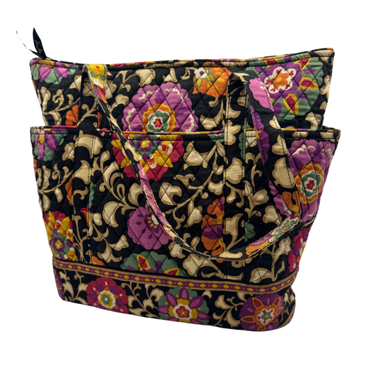 quilted fabric Vera Bradley Shoulder Bag with Vibrant Floral Design set against a black background