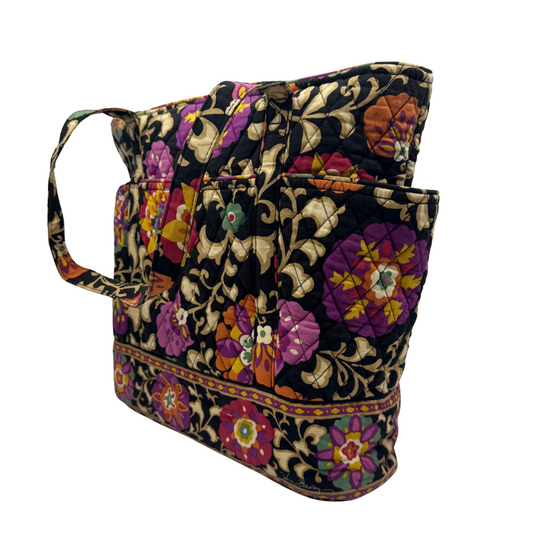 quilted fabric Vera Bradley Shoulder Bag with Vibrant Floral Design set against a black background