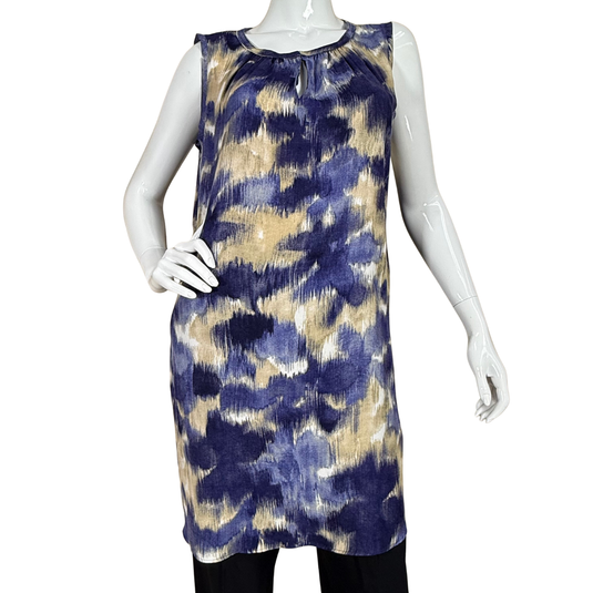 Mannequin wearing a sleeveless dress with blue and beige abstract pattern on a white background