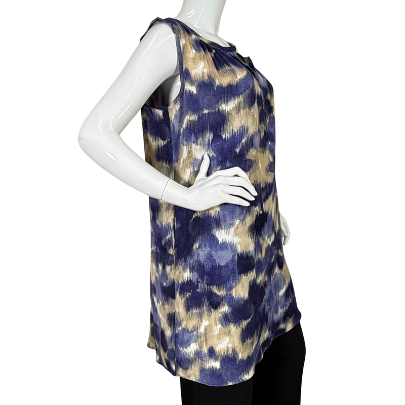Load image into Gallery viewer, Mannequin wearing a sleeveless top with blue and beige abstract pattern on a white background
