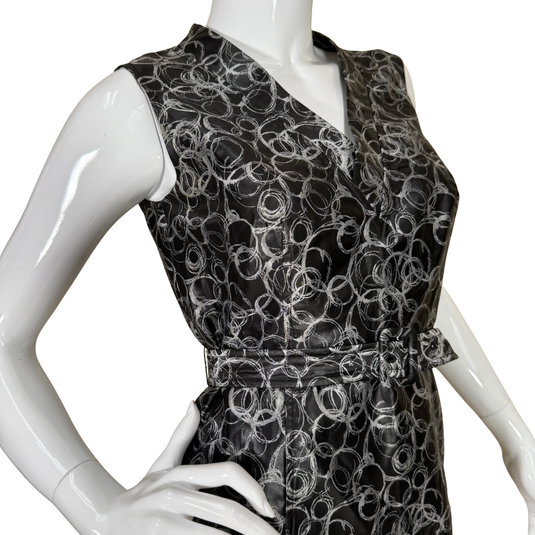  black sleeveless pre-loved Vera Wang Lavender Label Dark Dress with Ring Print Pattern showcases a unique all-over white circular swirl pattern for a dynamic, artistic edge