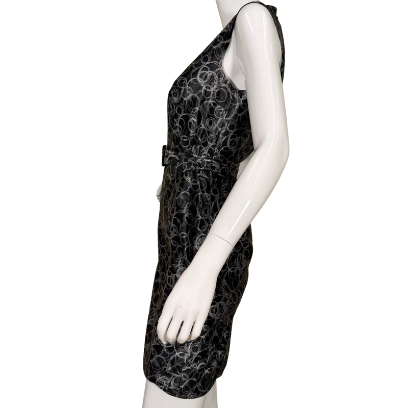 Load image into Gallery viewer, Black dress with white pattern on a mannequin against a white background
