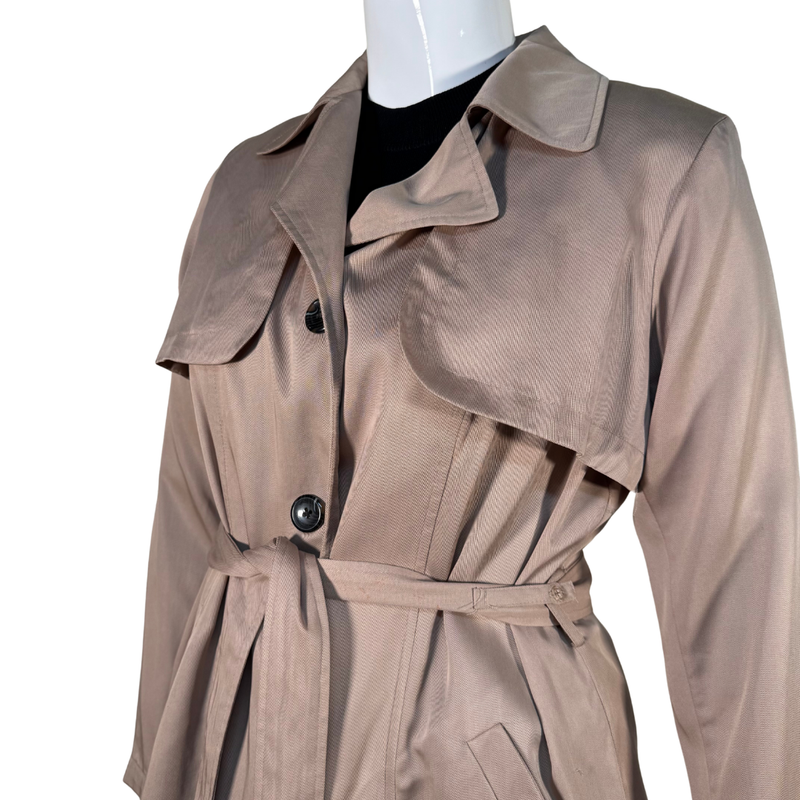 Load image into Gallery viewer, Beige trench coat on a mannequin against a white background
