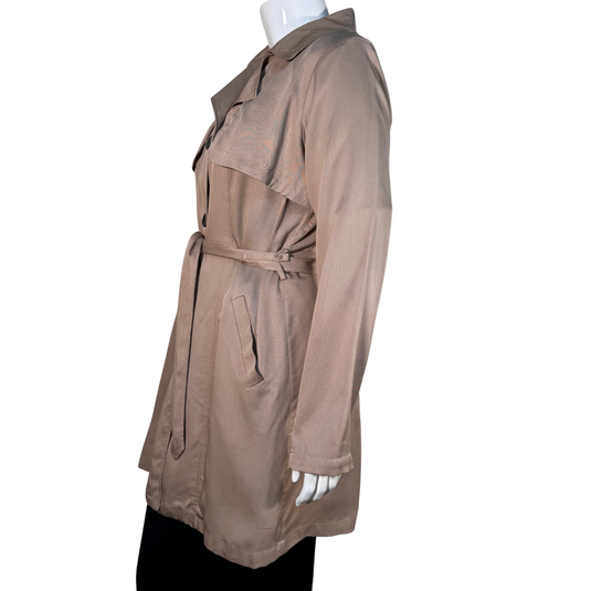 Beige trench coat on a mannequin against a white background