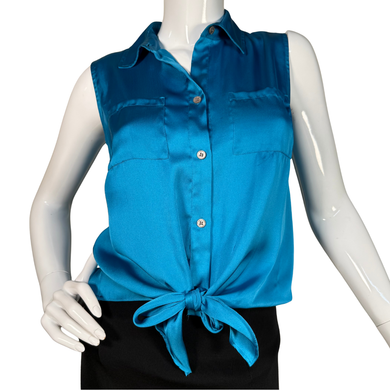 Blue sleeveless blouse with a tie detail on a mannequin against a white background