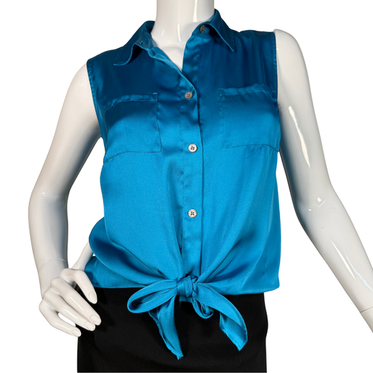 Blue sleeveless blouse with a tie detail on a mannequin against a white background