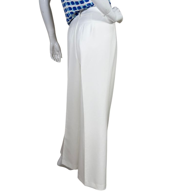 Load image into Gallery viewer, White pants on a mannequin against a white background
