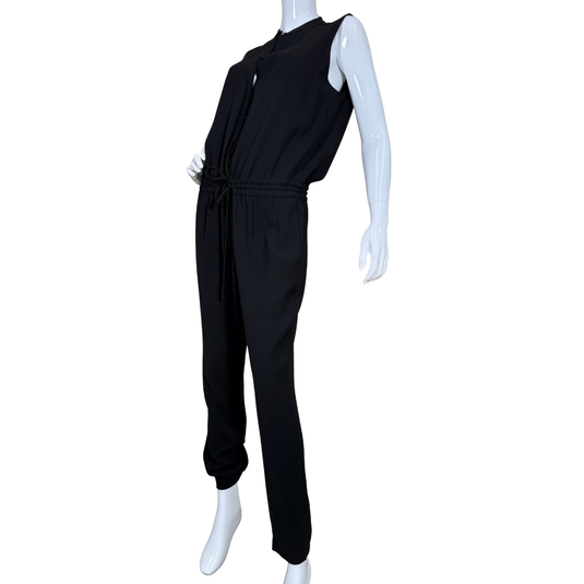 Vince Chic Black Sleeveless Jumpsuit. Designed with a flattering drawstring waist and relaxed tapered legs, this piece offers both comfort and sophistication