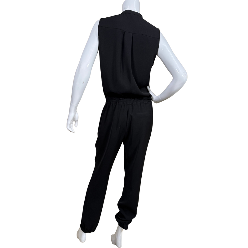 Load image into Gallery viewer, Black sleeveless top and pants set on a white mannequin against a white background
