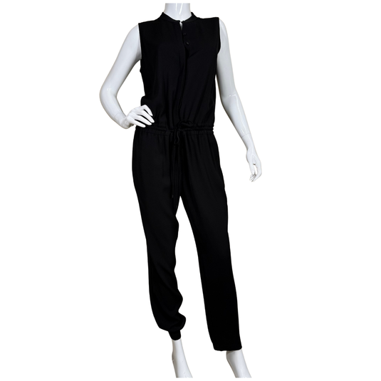 Black jumpsuit on a mannequin against a white background