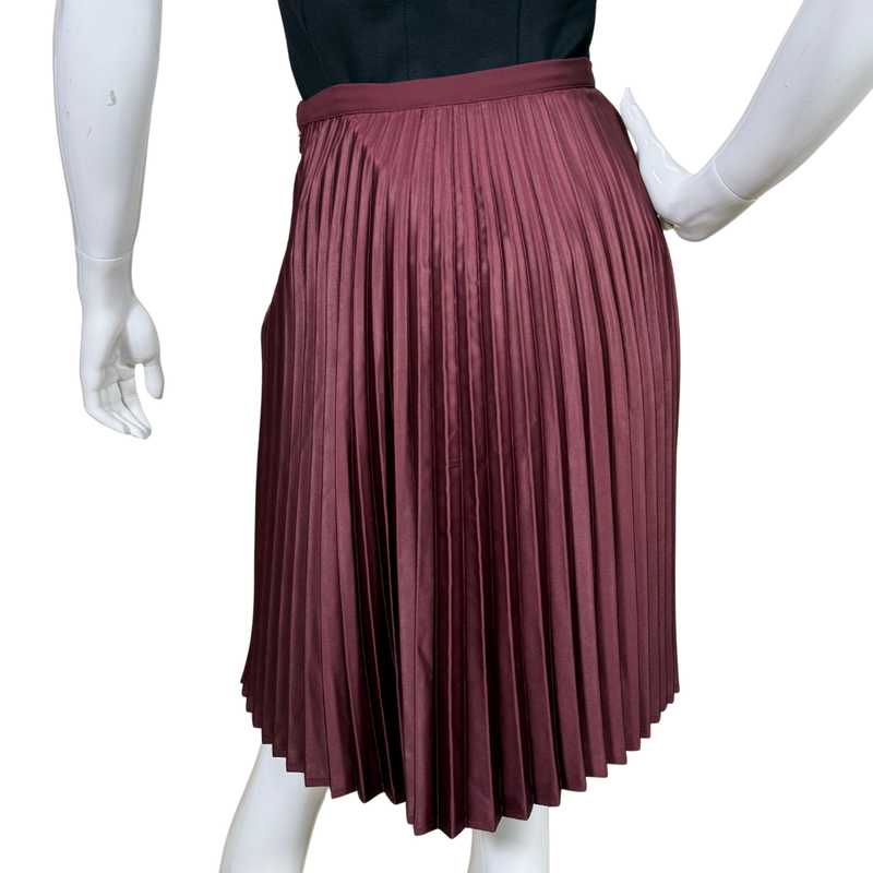 Load image into Gallery viewer, Maroon pleated skirt on a mannequin against a white background
