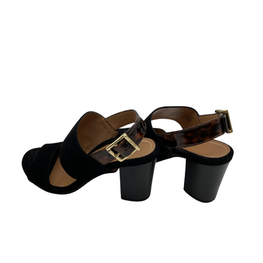 Vionic Black Tort Heel with Leopard Strap shoes are black, open-toe sandals with a block heel.