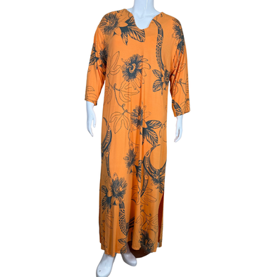 vibrant donated Wahine Toa Designs Orange Polynesian Dress with Lilikoi Flowers is adorned with an oversized tropical floral print in dark navy, creating a bold and eye-catching contrast