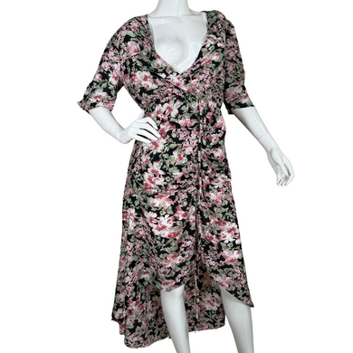 feminine Walter Baker Romantic Floral Dress features a stunning pink, white, and green blossom print set against a dark background for a dramatic yet romantic look