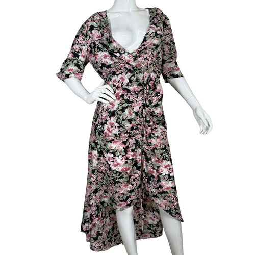 feminine Walter Baker Romantic Floral Dress features a stunning pink, white, and green blossom print set against a dark background for a dramatic yet romantic look