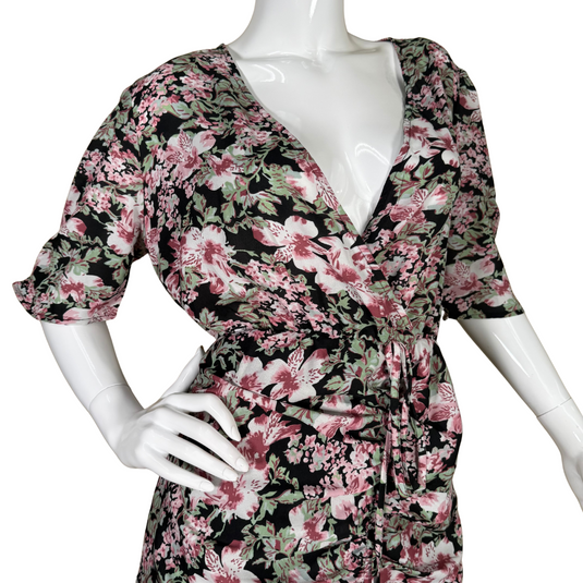 feminine Walter Baker Romantic Floral Dress features a stunning pink, white, and green blossom print set against a dark background for a dramatic yet romantic look