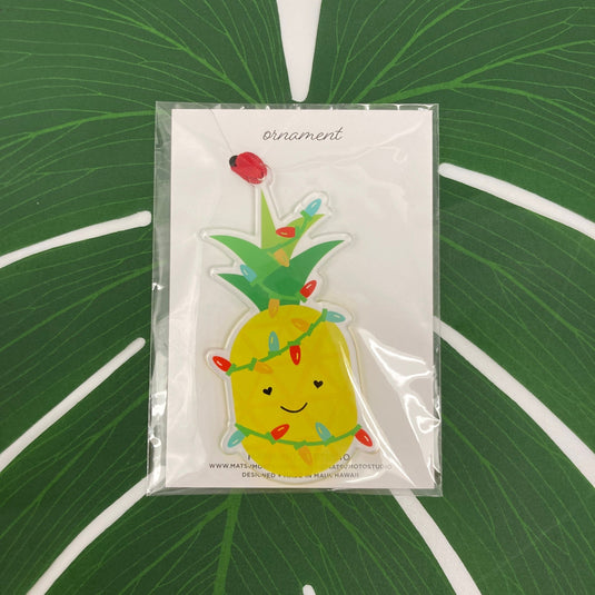 Aloha Christmas Pineapple Set by Matsumoto Studio on leaf showing pineapple ornament,