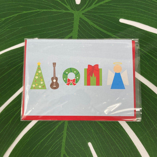 Aloha Christmas Pineapple Set by Matsumoto Studio on leaf showing greeting card