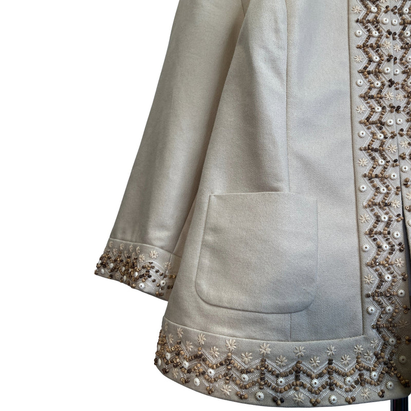 Load image into Gallery viewer, Dana Buchman Beaded Tan Jacket on mannequin close up view
