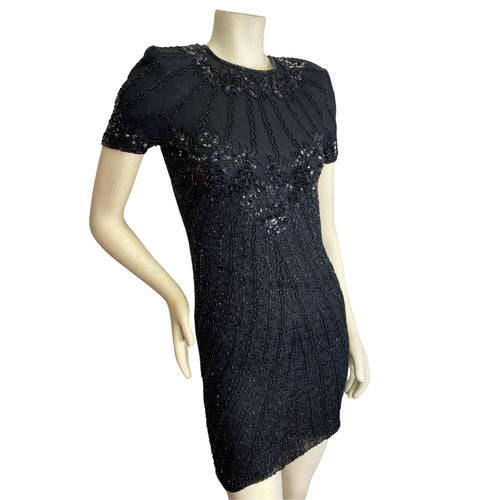 Adrianna Papell Black Beaded Cocktail Dress on mannequin front view