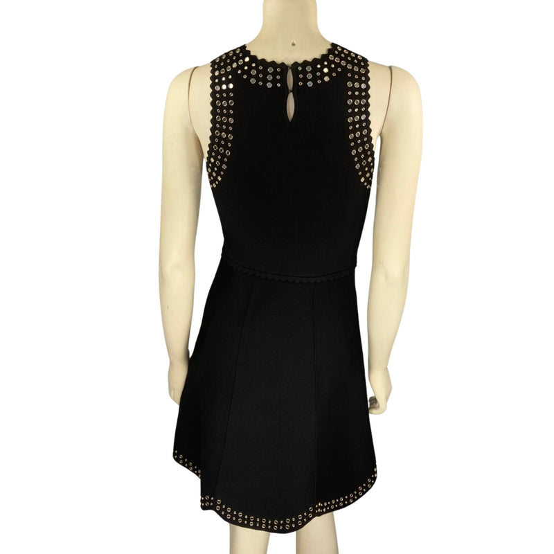 Load image into Gallery viewer, Sandro Black Scallop Dress on mannequin back view
