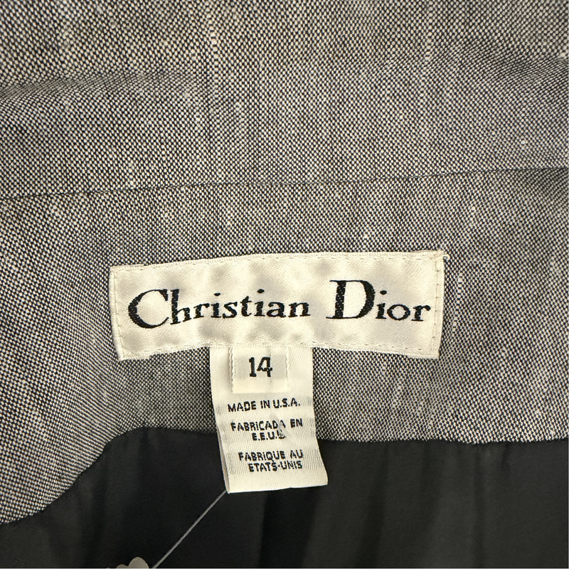 Load image into Gallery viewer, Christian Dior label on a garment with size 14
