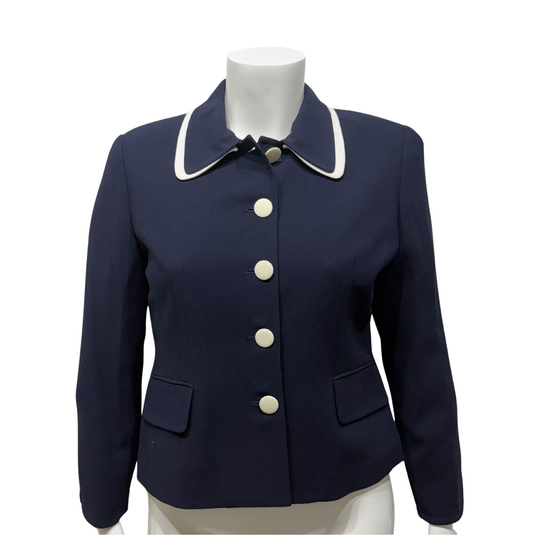 Navy blue jacket with white buttons on a mannequin against a white background