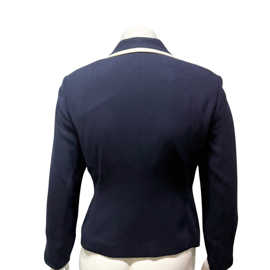Navy blazer on a mannequin with a white background