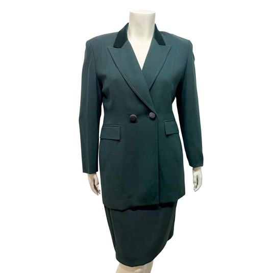 Green suit on a mannequin against a white background