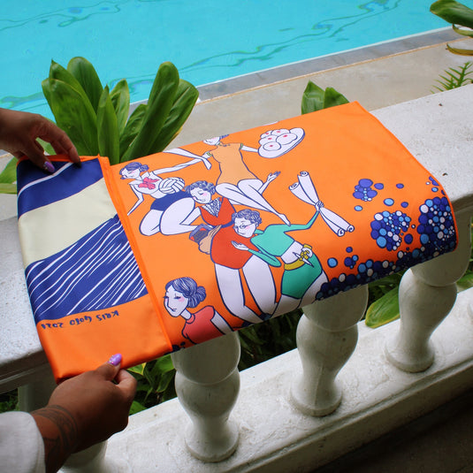  Women of YWCA O‘ahu Microfiber Beach Towel by Kris Goto folded